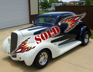 Left front 1936 Plymouth Custom Coupe